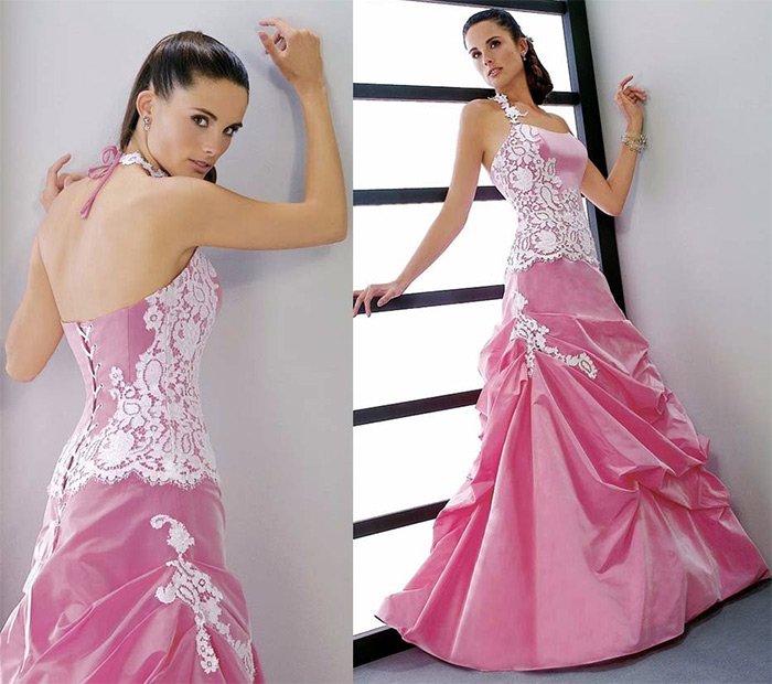 Fille dans une robe de mariée rose