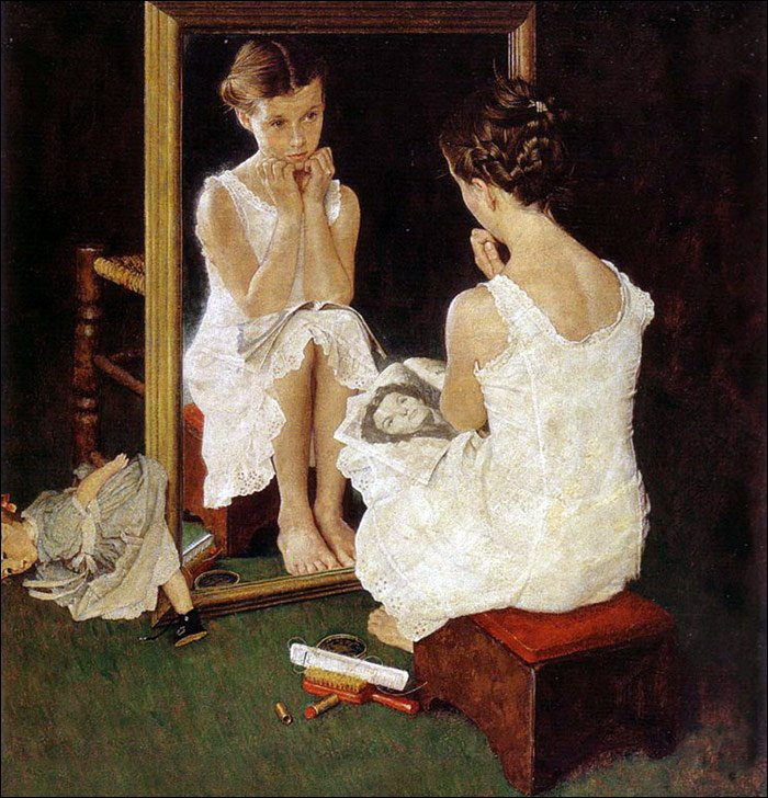 fille avec un magazine près du miroir